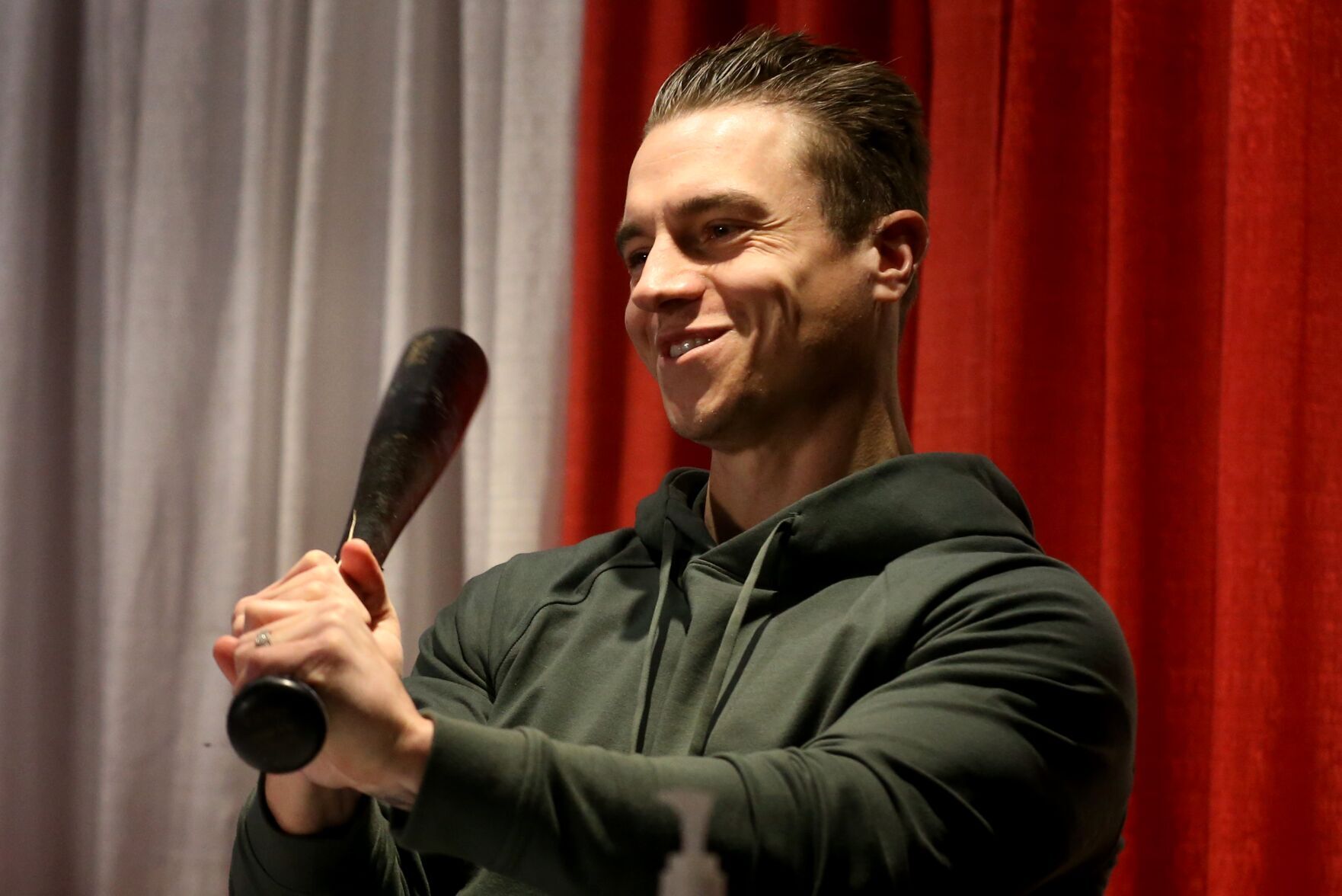 St. Louis Cardinal left fielder Tyler O'Neill signs autographs